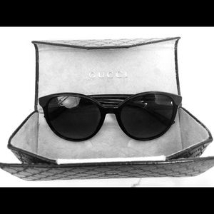 Gucci sunglasses with case.